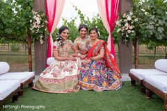 Indian bie posing with relatives at mehndi party. Indian bie posing with relatives at mehndi party.