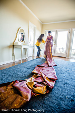 Maharani being assisted with saree prior to the ceremony. Maharani being assisted with saree prior to the ceremony.