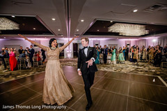 Indian couple making their big entrance to reception party. Indian couple making their big entrance to reception party.