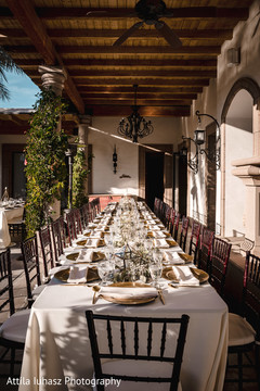Long table with silverware and plates. Long table with silverware and plates.