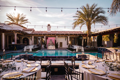 Tables arranged in front of the pool during daylight. Tables arranged in front of the pool during daylight.