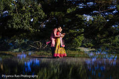 Indian bride and groom posing during the photoshoot. Indian bride and groom posing during the photoshoot.