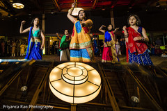 Guests performing a choreography during Sangeet. Guests performing a choreography during Sangeet.