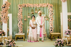 Indian bride and groom posing for pictures. Indian bride and groom posing for pictures.