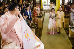 Indian bride making her entrance to the ceremony. Indian bride making her entrance to the ceremony.