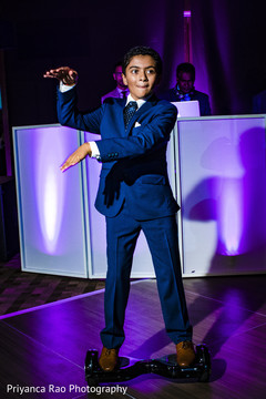 Kid guest dancing during the reception. Kid guest dancing during the reception.