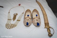 The sword, shoes and jewels to be worn by the Indian groom The sword, shoes and jewels to be worn by the Indian groom