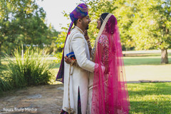 Indian couple hugging and laughing on the yard Indian couple hugging and laughing on the yard