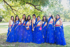 Indian bridesmaids posing at the yard Indian bridesmaids posing at the yard