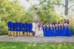 Indian bride and Indian groom posing with groomsmen and bridesmaids Indian bride and Indian groom posing with groomsmen and bridesmaids