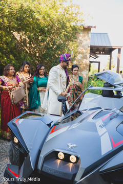 Indian groom getting into the Baraat car Indian groom getting into the Baraat car