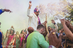 Indian groom being carried druring the Baraat procession Indian groom being carried druring the Baraat procession