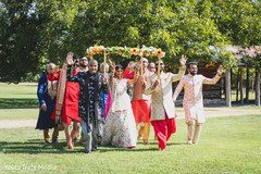 Maharani surrounded by Indian relatives walking to the wedding area Maharani surrounded by Indian relatives walking to the wedding area