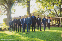 Indian groom and his Indian groomsmen posing in the yard Indian groom and his Indian groomsmen posing in the yard