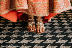 A take of Maharani's henna stained feet wearing her shoes A take of Maharani's henna stained feet wearing her shoes