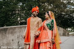 Indian groom and his Maharani walking hand in hand Indian groom and his Maharani walking hand in hand
