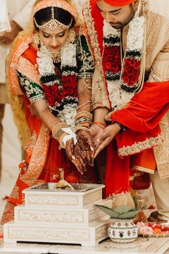 Indian couple in front of the sacred fire Indian couple in front of the sacred fire