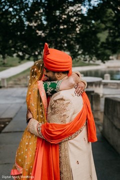 Indian bride and Indian groom hugging Indian bride and Indian groom hugging