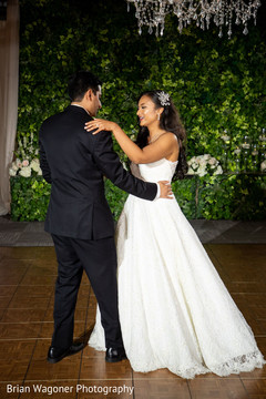 Indian lovebirds having their first dance. Indian lovebirds having their first dance.