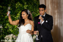 Indian bride and groom having cheers at reception party. Indian bride and groom having cheers at reception party.