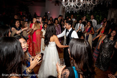 Indian guests sharing with indian couple at reception party. Indian guests sharing with indian couple at reception party.
