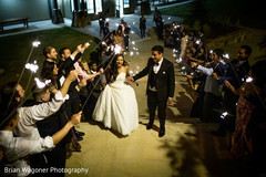 Indian couple leaving reception party capture. Indian couple leaving reception party capture.