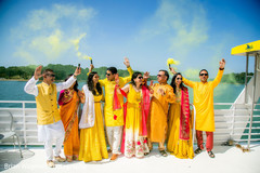 Indian couple with relatives on their yellow outfits. Indian couple with relatives on their yellow outfits.