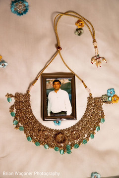 Indian bridal kundan choker necklace and rings on portrait. Indian bridal kundan choker necklace and rings on portrait.