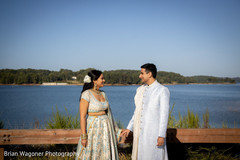 Indian bride and groom's romantic first look moment. Indian bride and groom's romantic first look moment.