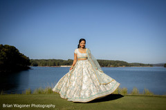 Cute indian bride on her white and light blue lehenga. Cute indian bride on her white and light blue lehenga.