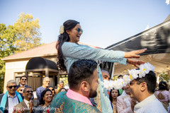 Maharani putting white garland to bride. Maharani putting white garland to bride.