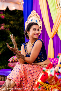Maharani smiling during her mehndi party. Maharani smiling during her mehndi party.
