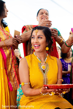 Maharani holding plate during haldi ceremony. Maharani holding plate during haldi ceremony.