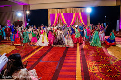 Bridesmaids and Indian relatives dancing in the Sangeet. Bridesmaids and Indian relatives dancing in the Sangeet.