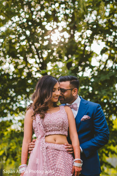 Indian groom hugging his Maharani during photo shoot. Indian groom hugging his Maharani during photo shoot.