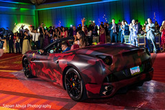 Indian couple riding a Ferrari. Indian couple riding a Ferrari.