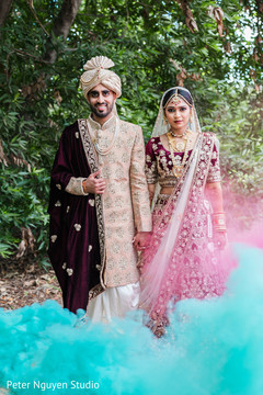 Indian bride and groom smoke bomb photoshoot. Indian bride and groom smoke bomb photoshoot.