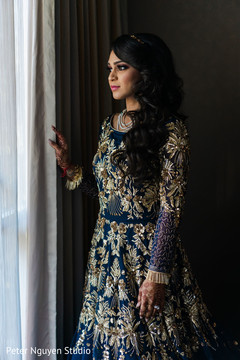 Indian bride's gold and blue anarkali. Indian bride's gold and blue anarkali.
