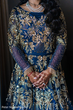 Royal blue Anarkali embellished with gold embroidery. Royal blue Anarkali embellished with gold embroidery.