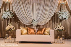 Beige themed Indian wedding reception stage. Beige themed Indian wedding reception stage.