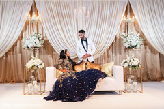 Elegant Indian couple's wedding reception portrait. Elegant Indian couple's wedding reception portrait.