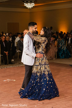 Indian bride and groom dancing together for their first time. Indian bride and groom dancing together for their first time.