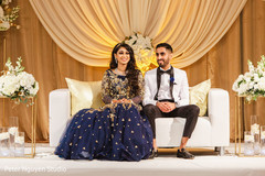 Indian couple enjoying their wedding reception. Indian couple enjoying their wedding reception.
