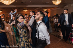 Indian couple having fun at the dance floor. Indian couple having fun at the dance floor.