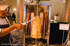 One of the catering team preparing the food One of the catering team preparing the food