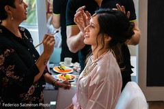 Indian bride being pampered before the ceremony. Indian bride being pampered before the ceremony.