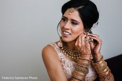Indian bride getting her jewelry ready for her ceremony. Indian bride getting her jewelry ready for her ceremony.