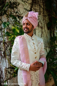 Indian groom's white brocade sherwani. Indian groom's white brocade sherwani.