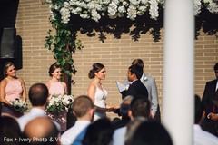Indian groom and bride during the ceremony under the mandap. Indian groom and bride during the ceremony under the mandap.