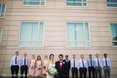 Indian couple posing with groomsmen and bridesmaids. Indian couple posing with groomsmen and bridesmaids.